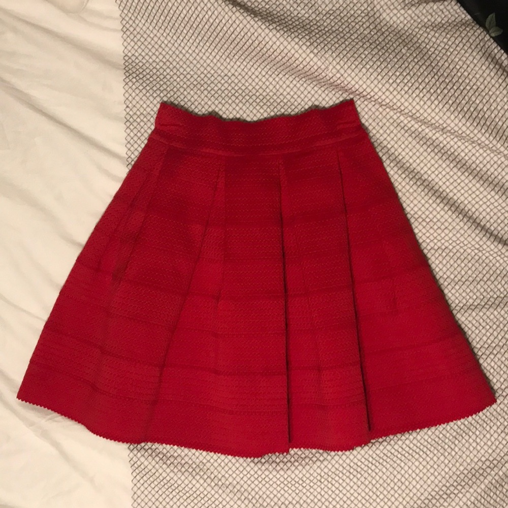 Red skirt with pleats